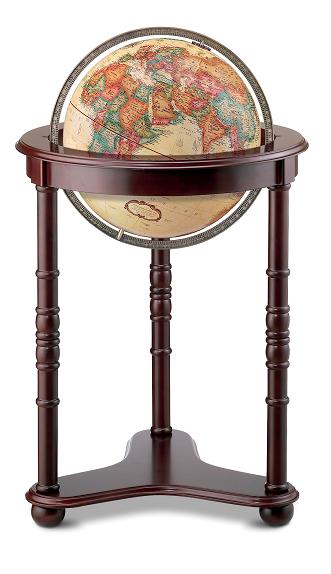 Large world globe on wooden floor stand